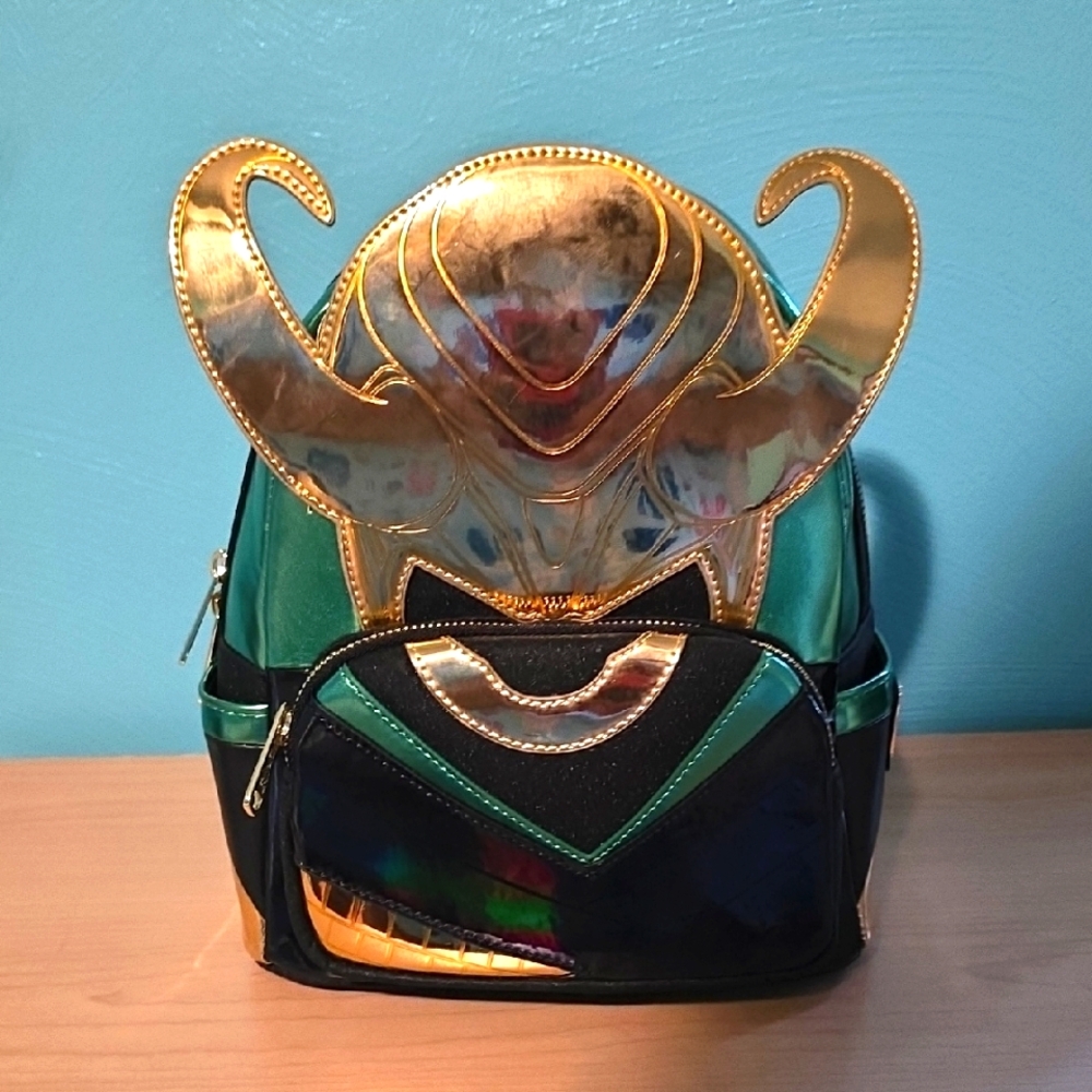 Loungefly Green and Gold Backpack with Horned Design